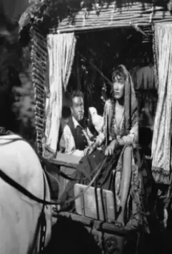 Кадр из Золотые серьги (1947) Кадр из Золотые серьги (1947)